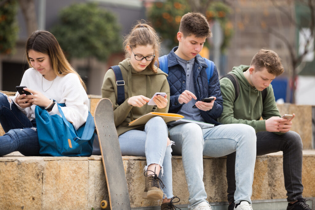 Under the Covers: The Blanket Ban on Teens Smartphones